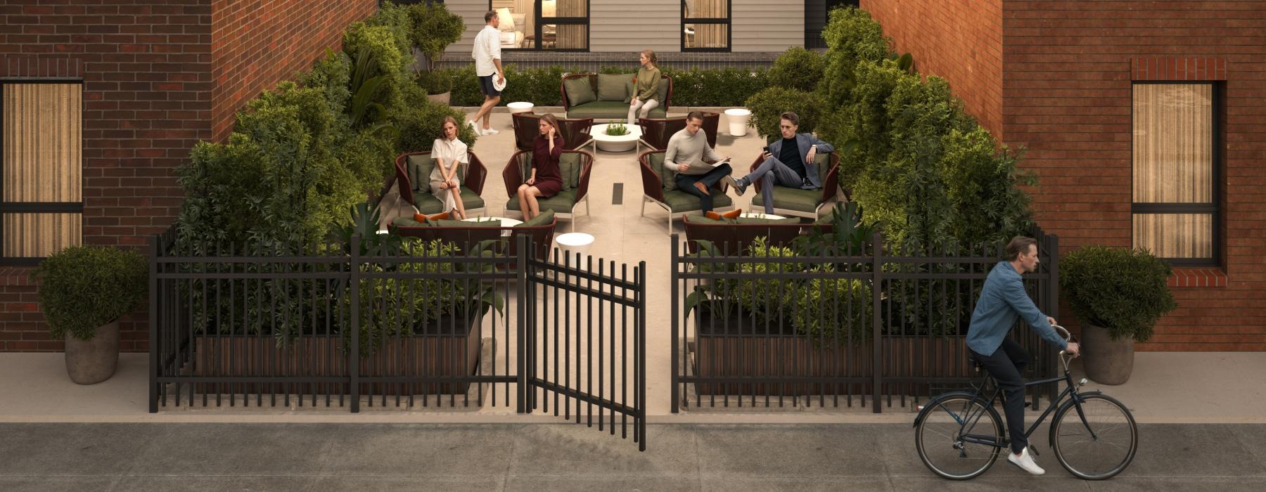 a group of people sitting outside a building