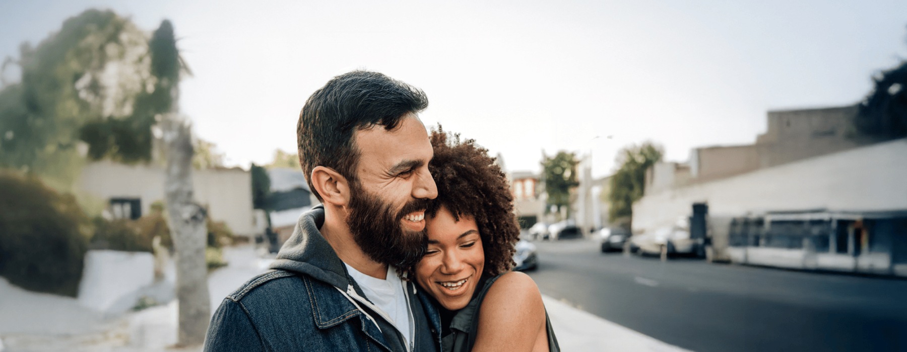 a man and woman smiling