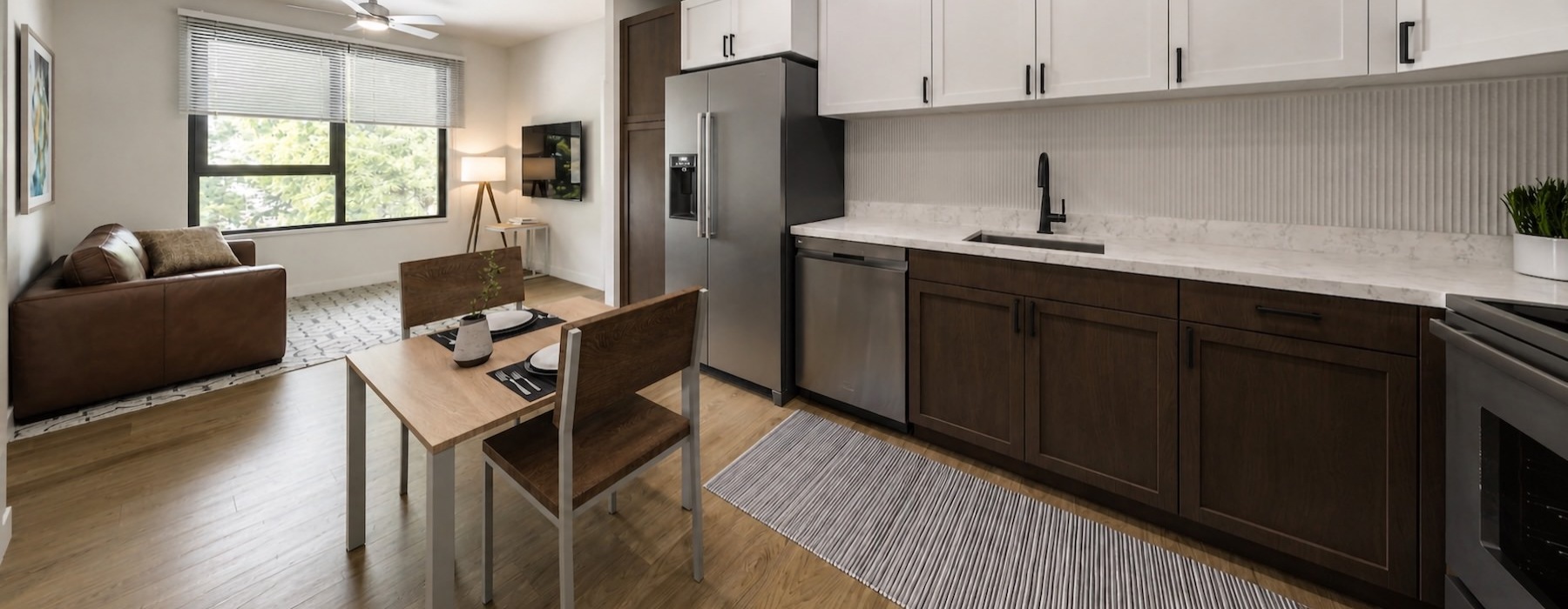 kitchen with table seating and stainless steel appliances 